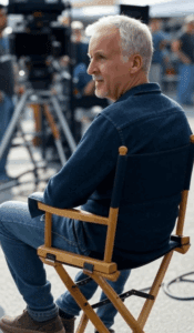 Man sitting on directors chair, film set.